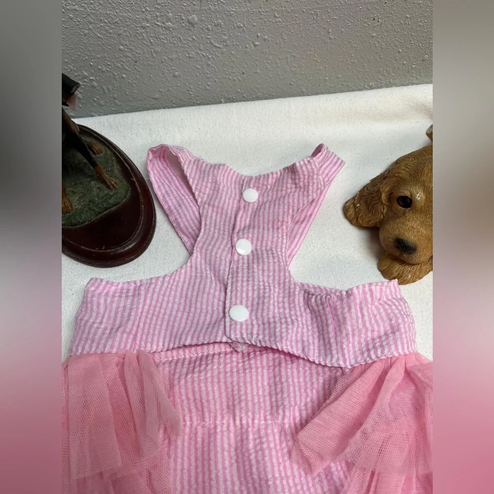 Pink and white striped ruffled dog dress with suspenders